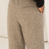 Naz women's sustainable wool trousers full lining in herringbone beige. Features a straight fit and side pockets. Made in Portugal.