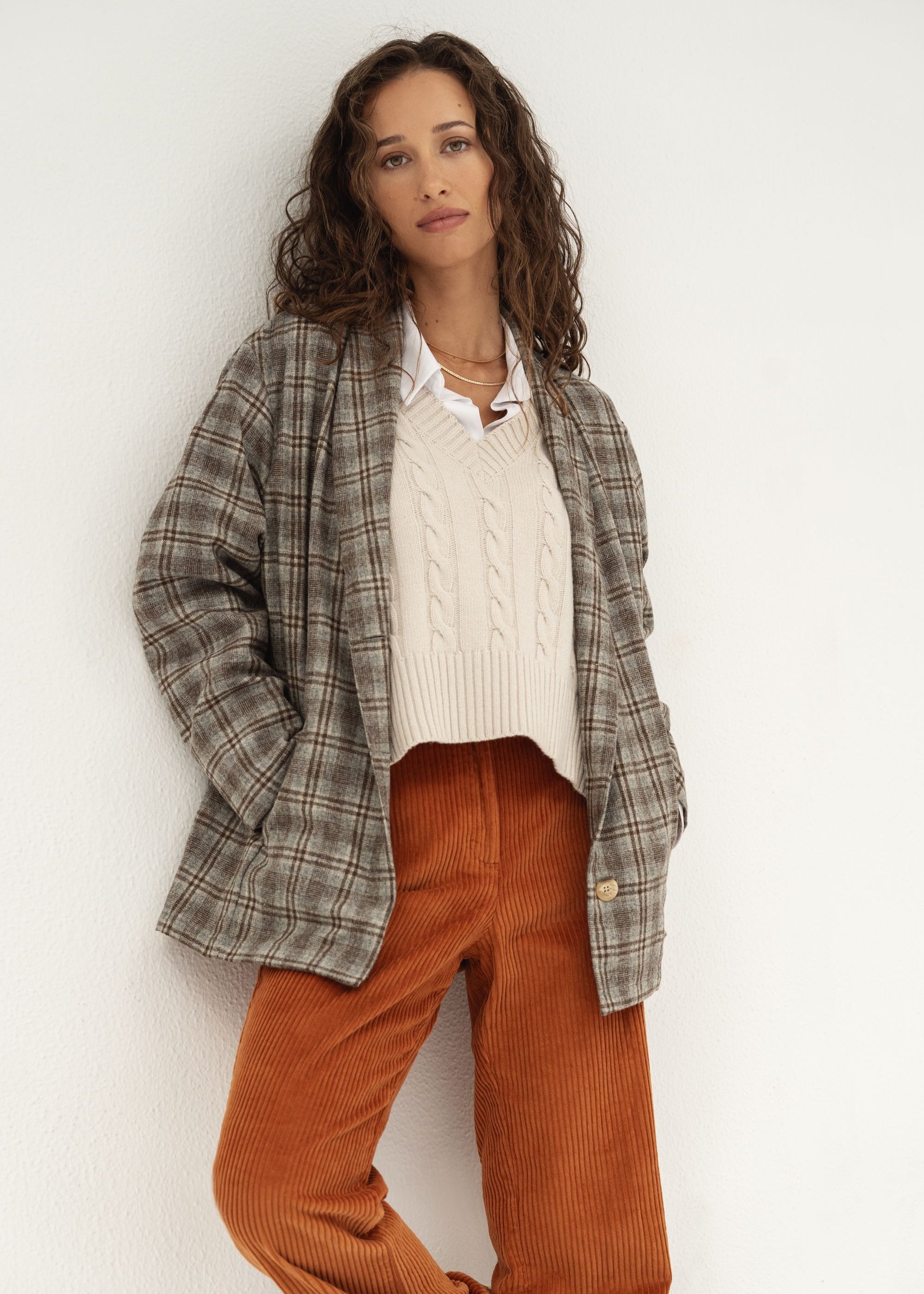 Naz women's checkered winter coat in grey. Features a relaxed regular fit. Made in Portugal.