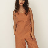 Naz women's recycled cotton jumpsuit for spring in rust. 