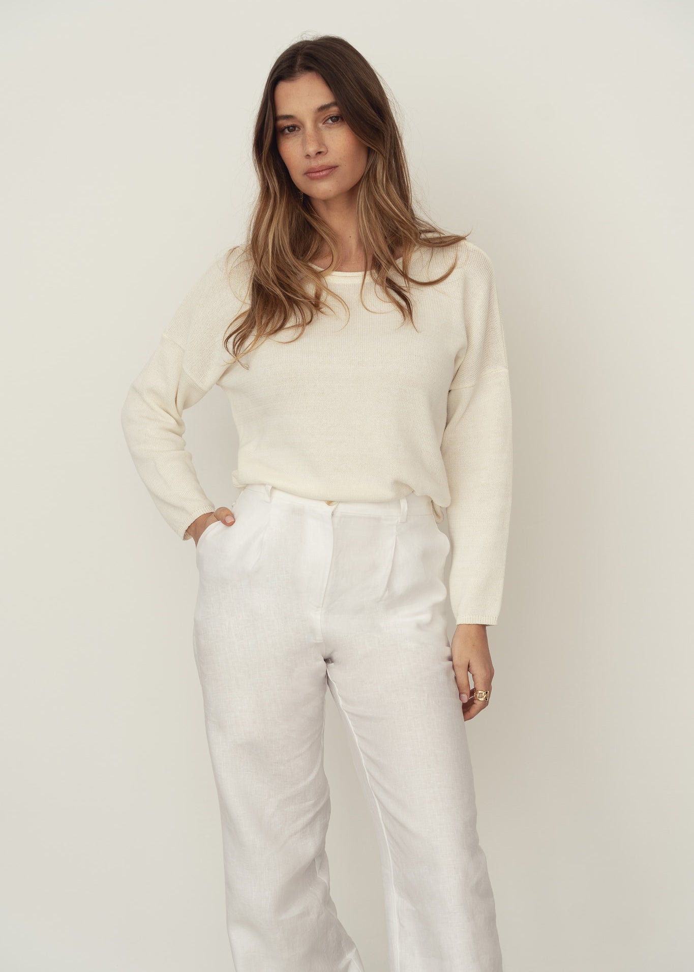 Naz women's sweater in with made with recycled cotton. Features a boat neck and a relaxed fit. Made ethically in Portugal. 