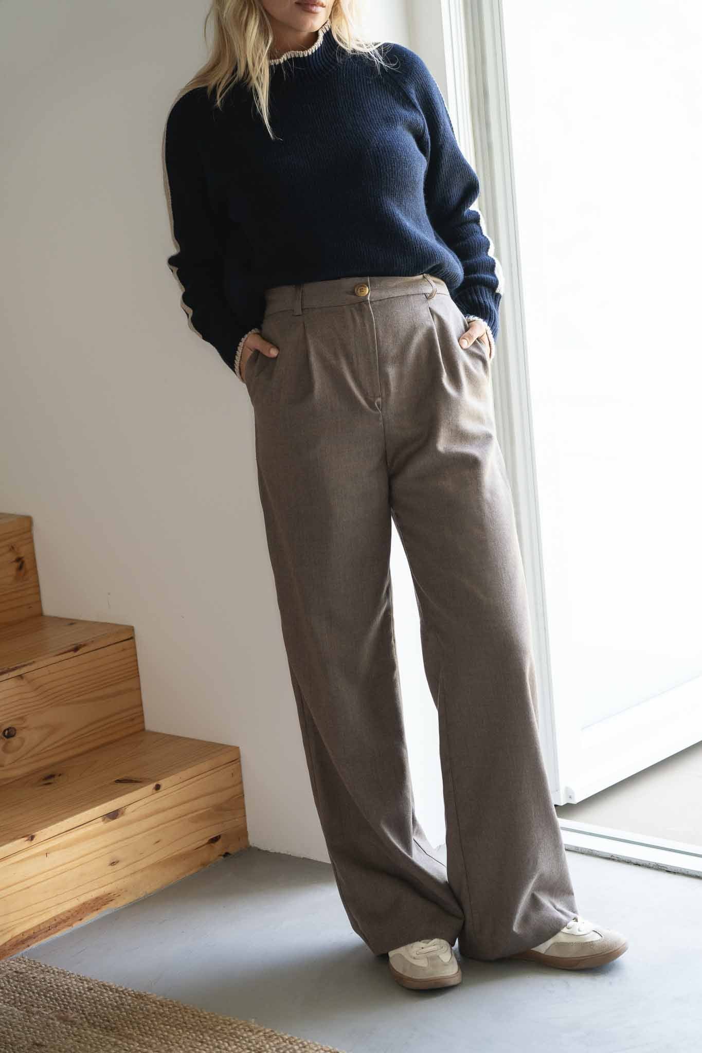 NAZ Mara Trousers in Beige. Made with 100% wool. Produced ethically in Portugal. Paired with the Agnes Wool Sweater in Navy