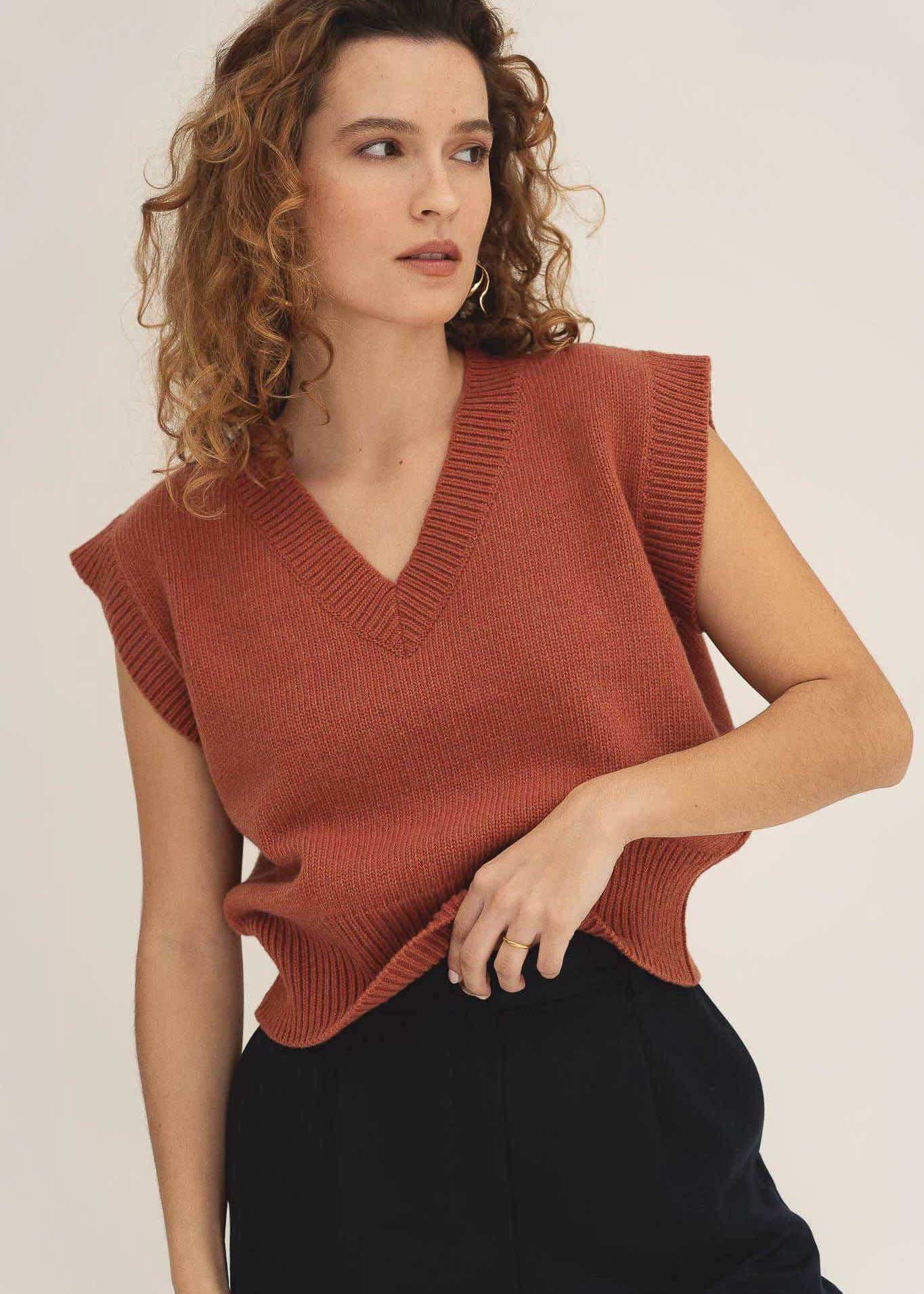 NAZ Alice Knit Vest in Brick. Made with 100% recycled wool.