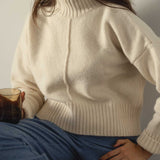 NAZ Emma Sweater in White. Made with 50% Recycled Aplaca and 50% Recycled Wool. Produced ethically in Portugal.