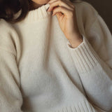 NAZ Claudia Sweater in White. Made with 50% Recycled Aplaca and 50% Recycled Wool. Produced ethically in Portugal.