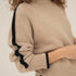 NAZ Agnes Sweater in Beige. Featuring a Navy color block detail. Made with 100% Recycled Wool.