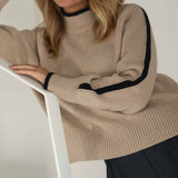 NAZ Agnes Sweater in Beige. Featuring a Navy color block detail. Made with 100% Recycled Wool.