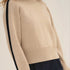 NAZ Agnes Sweater in Beige. Featuring a Navy color block detail. Made with 100% Recycled Wool.