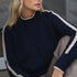 NAZ Agnes Sweater in Navy. Featuring a Beige color block detail. Made with 100% Recycled Wool.