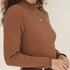 NAZ Ava Turtleneck in Terracota. Made with 100% deadstock cotton. Produced ethically in Portugal.