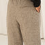 Naz women's sustainable wool trousers full lining in herringbone beige. Features a straight fit and side pockets. Made in Portugal. 