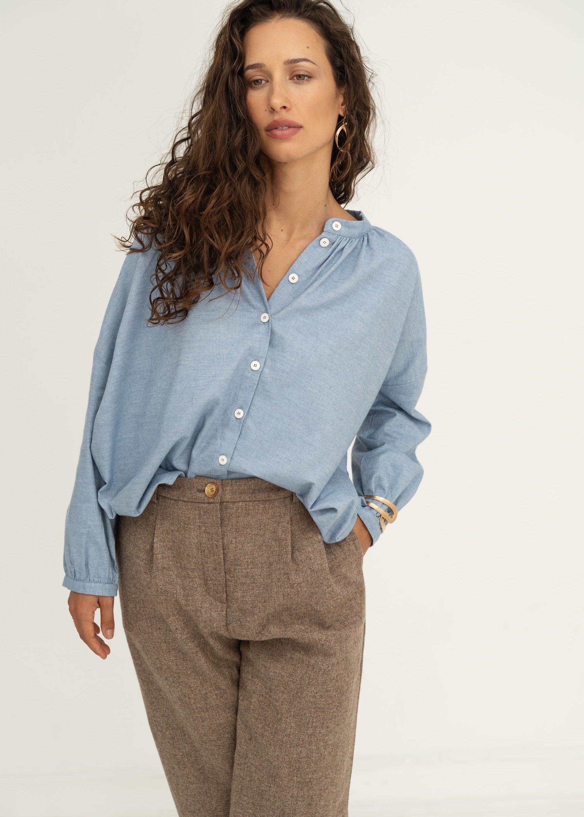 Naz long-sleeve buttoned blouse in wintery cotton-cashmere blend in blue. (Made from recycled materials).