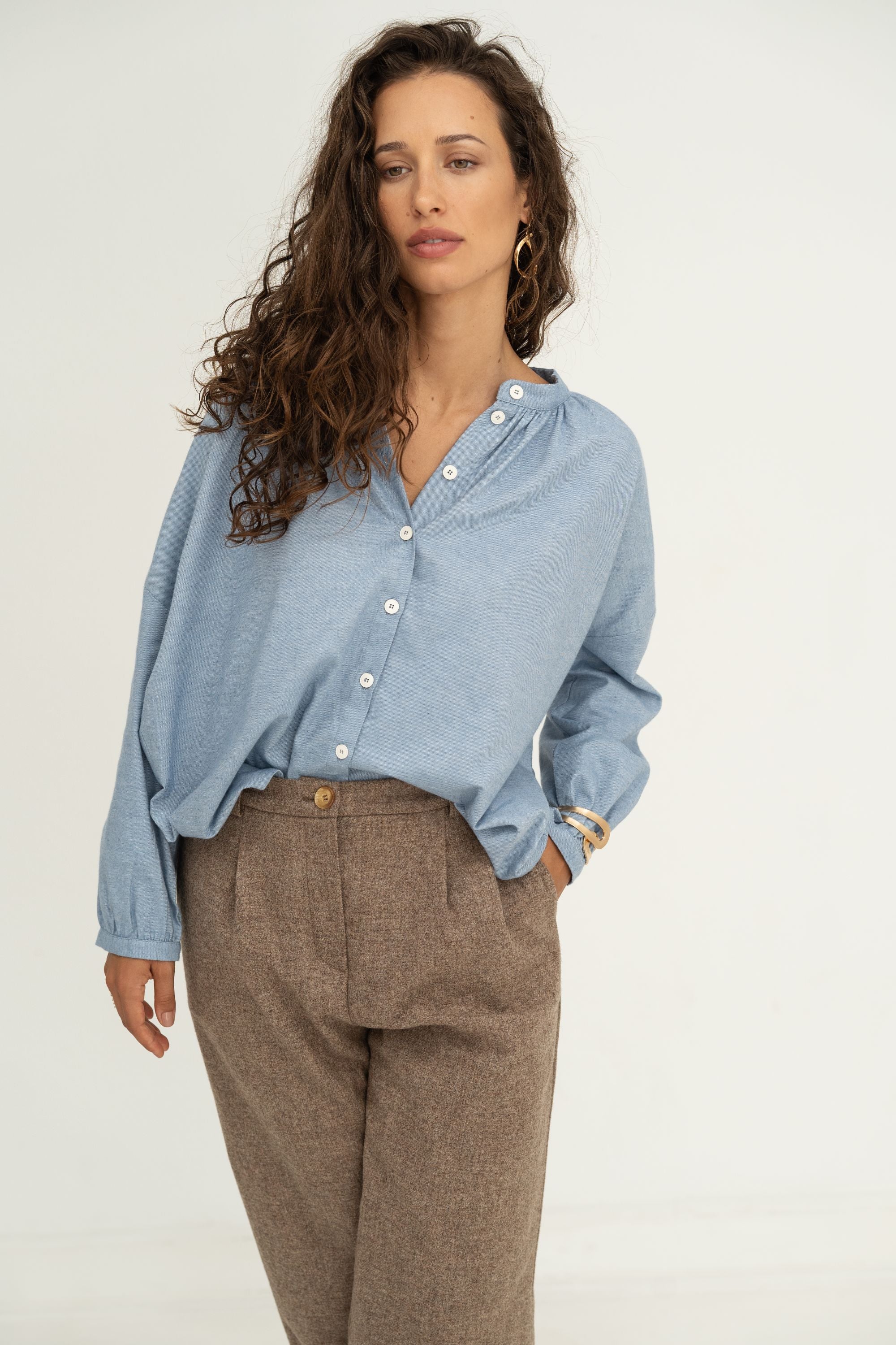 Naz long-sleeve buttoned blouse in wintery cotton-cashmere blend in blue. (Made from recycled materials).