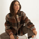 Naz women's checkered bomber jacket in brown. Made from recycled wool. Features an oversized fit.