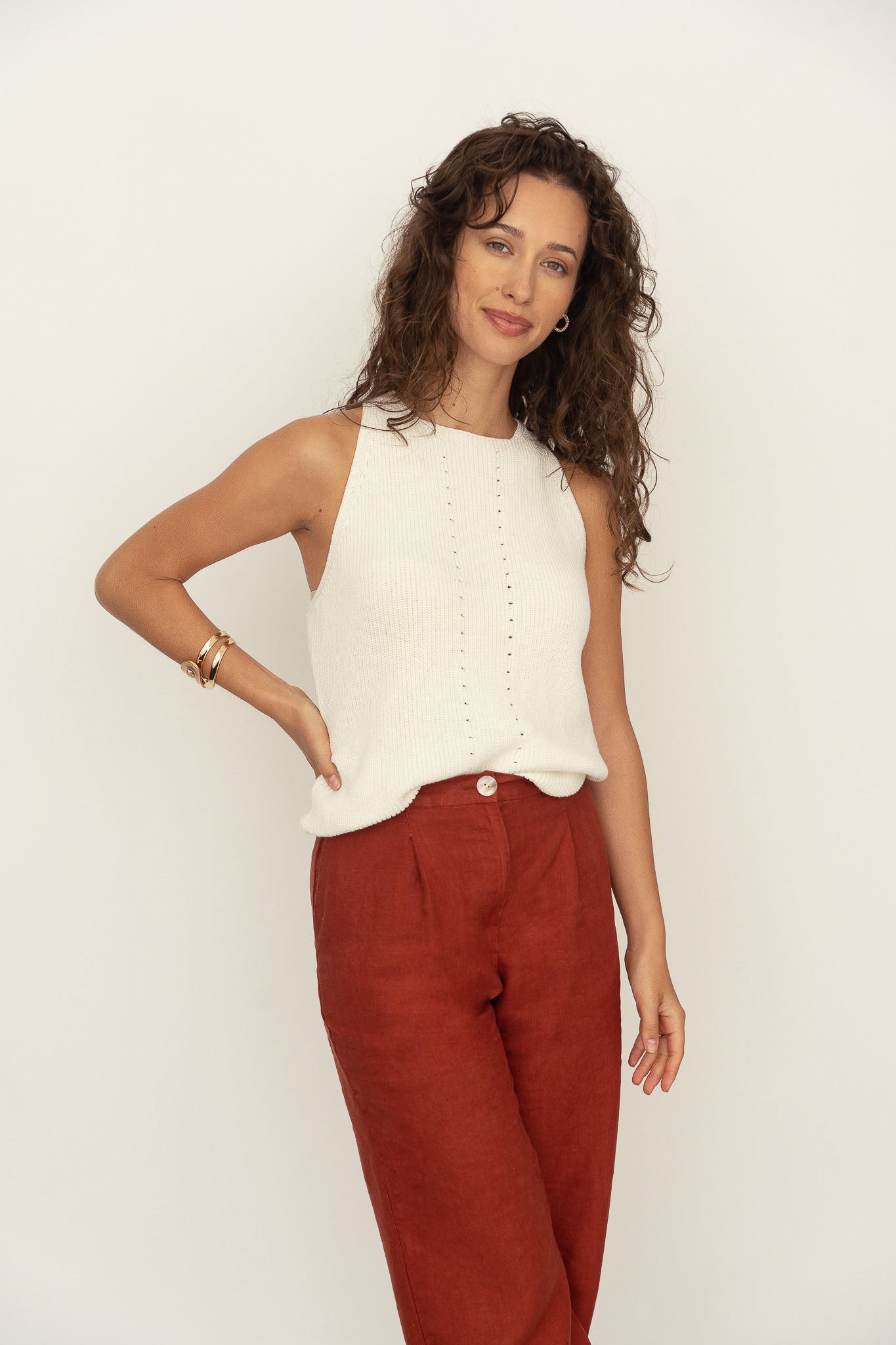 Naz women's tailored linen trousers in rust. Ethically made in Portugal. 