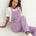 Naz women's corduroy overalls in lilac made from a blend of recycled and conventional cotton. 